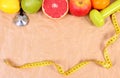 Fresh fruits, centimeter, stethoscope and dumbbells for fitness, healthy lifestyles Royalty Free Stock Photo