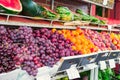 Fresh fruits on the counter - grapes, plums, peaches, apricots, watermelons and others. Seasonal trade. Street market. Organic, Royalty Free Stock Photo