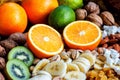 Fresh fruits. Healthy food. Mixed fruits and nuts background.Healthy eating, dieting, love fruits. Royalty Free Stock Photo