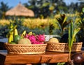 Fresh fruits on a plate in Interior of a traditional Balinese cafe in a rice field.
