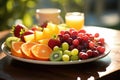 fresh fruits on a plate with soft sunlight falling on them Royalty Free Stock Photo