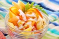 fresh fruits salad with papaya,banana,orange,pineapple and coconut