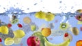 Fresh Fruits shot as they submerged unde water background food delicious splash in aquarium Royalty Free Stock Photo