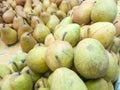 Fresh fruits in small boxes for sale on the farm, pears with stems. Pears at the farmers market, food market, fruit stand Royalty Free Stock Photo