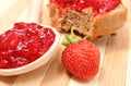 Fresh fruits and strawberry jam on wooden cutting board Royalty Free Stock Photo