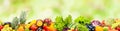 Fresh fruits, vegetables, berries on green background. Seamless pattern Royalty Free Stock Photo