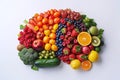 fresh fruits and vegetables for a healthy food and vegetarian nutrition in shape of human brain. View top flat lay on