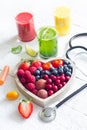 Fresh fruits vegetables and heart shape with stethoscope health diet concept Royalty Free Stock Photo