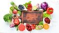 Fresh fruits and vegetables on a white wooden background. Top view. Royalty Free Stock Photo