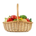 Fresh fruits and vegetables in a wicker basket. Isolated Royalty Free Stock Photo