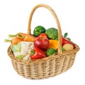 Fresh fruits and vegetables in a wicker basket. Isolated Royalty Free Stock Photo