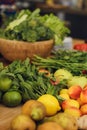 Fresh fruits and vegetables on a wooden table. Green vegetables, broccoli, herb, parsley. Peaches, lime, apples, pears, lemons. Royalty Free Stock Photo