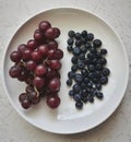 Fresh fruits in a white plate. Royalty Free Stock Photo