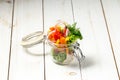 Fresh garden healthy vegetables in a glass jar Royalty Free Stock Photo