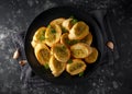 Fresh Garlic Bread bread, toast on black plate Royalty Free Stock Photo