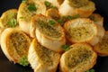 Fresh Garlic Bread, toast on black plate Royalty Free Stock Photo