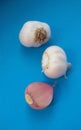 Fresh garlic bulbs over blue background. Organic and healthy. Royalty Free Stock Photo