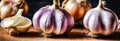 Fresh garlic bulbs and a sliced onion on a rustic wooden table, AI-generated. Royalty Free Stock Photo