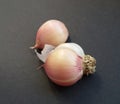 Fresh garlic cloves over black background. Organic and healthy.