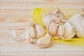 Fresh garlic cloves with wooden texture background Royalty Free Stock Photo
