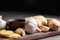 Fresh garlic and other natural cold remedies on table Royalty Free Stock Photo