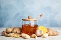 Fresh garlic and other natural cold remedies on table Royalty Free Stock Photo