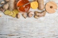 Fresh garlic and other natural cold remedies on wooden table, flat lay. Space for text Royalty Free Stock Photo