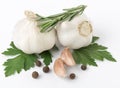 Fresh garlic with rosemary and parsley isolated on white background. Raw garlic Royalty Free Stock Photo