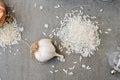 Fresh Garlic on Table with Rice . Closeup Photo. Healthy Food Spicy Cooking