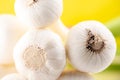 Fresh garlic on yellow background Royalty Free Stock Photo