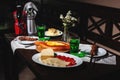 fresh Georgian meal with khachapuri, shashlik kebab with beef or lamb meat, tomato with cheese and green tarragon drink