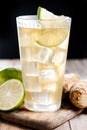 Fresh ginger ale drink in tall glass on wooden table Royalty Free Stock Photo