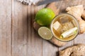 Fresh ginger ale drink in tall glass on wooden table Royalty Free Stock Photo