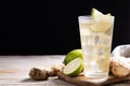 Fresh ginger ale drink in tall glass on wooden table Royalty Free Stock Photo