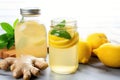 fresh ginger, lemons, and a jar of homemade ginger-lemon kombucha