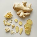 Fresh Ginger Root and Slices on White Surface sliced ginger Royalty Free Stock Photo
