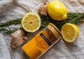 Fresh ginger rosemary and lemon with ground turmeric spice Royalty Free Stock Photo