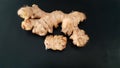 Fresh ginger spices with black background Royalty Free Stock Photo