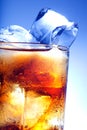 A fresh glass of cola with ice