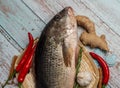 Fresh Golden Snapper on rattan plate.