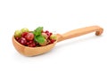 Fresh gooseberries and currants in wooden spoon isolated on white Royalty Free Stock Photo