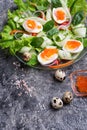 Fresh gourmet salad with red salmon caviar and eggs and vegetables. Protein luxury delicacy healthy food. beautifull served