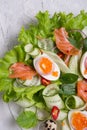 Fresh gourmet salad with red salmon caviar and eggs and vegetables. Protein luxury delicacy healthy food. beautifull served