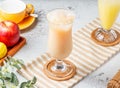 fresh Grapefruit a lot iced tea in a glass jar on mat and white background. fresh Healthy drinks concept