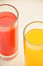 Fresh grapefruit and orange juice. Vitamins for health. Royalty Free Stock Photo