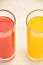 Fresh grapefruit and orange juice. Vitamins for health. Royalty Free Stock Photo