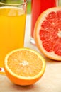 Fresh grapefruit and orange juice. Vitamins for health. Royalty Free Stock Photo
