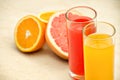 Fresh grapefruit and orange juice. Vitamins for health. Royalty Free Stock Photo