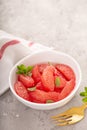 Fresh grapefruit slices in a bowl Royalty Free Stock Photo