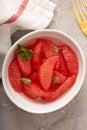 Fresh grapefruit slices in a bowl Royalty Free Stock Photo